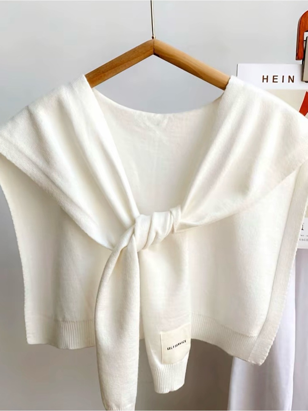 Elegant White Knit Sweater Vest with Tie Front